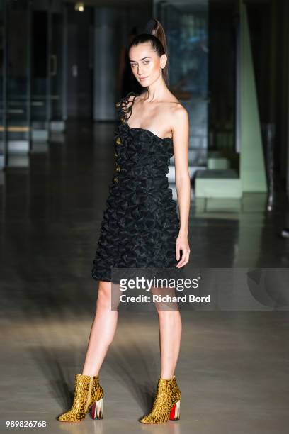 Model walks the runway during the Noureddine Amir Haute Couture Fall Winter 2018/2019 show as part of Paris Fashion Week on July 2, 2018 in Paris,...