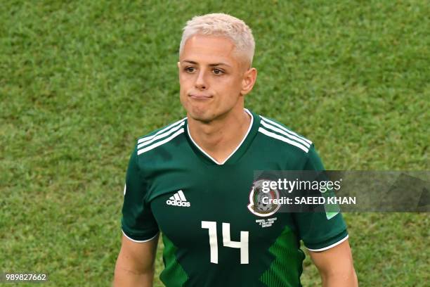 Mexico's forward Javier Hernandez leaves the pitch after their defeat during the Russia 2018 World Cup round of 16 football match between Brazil and...