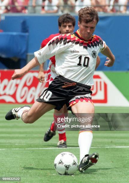 German team captain and midfielder Lothar Matthaeus is about to kick ball and score the 1-0 goal with a penalty kick in the 49th minute of the 1994...