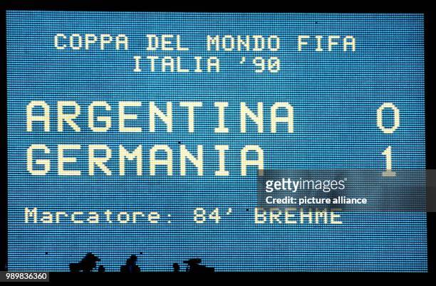 The scoreboard of the Olympic Stadium in Rome, Italy shows it in bold bright letters on the late evening on 08 July 1990: Argentina 0 The German...
