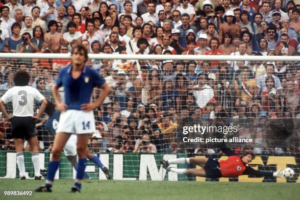 Italian forward Marco Tardelli turns around. He does not want to watch his teammate defender Antonio Cabrini shooting the penalty. German midfielder...