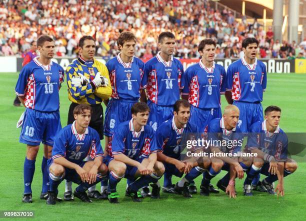 The players of the Croatian national team line-up for a group picture picture before the start of the 1998 World Cup quarter final Germany against...