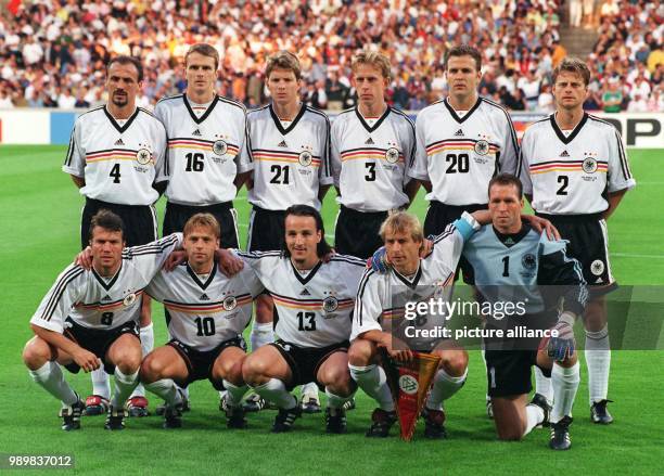 The players of the German national soccer team line-up for a group picture before the start of the 1998 World Cup quarter final Germany against...