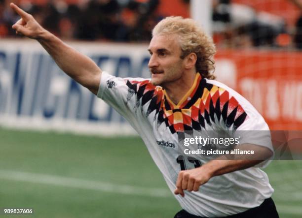 German forward Rudi Voeller jubilates after scoring a goal in the World Cup second round game against Belgium, at the Soldier Field Stadium in...