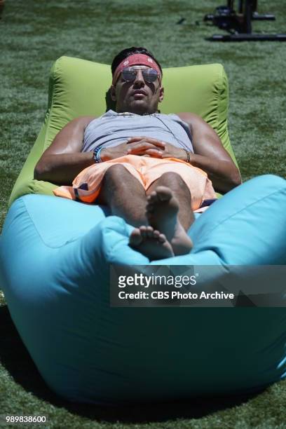 Faysal Shafaat relaxing in the Big Brother backyard. BIG BROTHER follows a group of people living together in a house outfitted with 94 HD cameras...