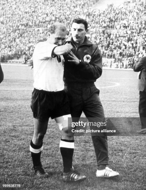 Stopper Herbert Erhardt is leaving the pitch crying after being eliminated. After losing the 1962 FIFA World Cup quarter final 0:1 against Yugoslavia...