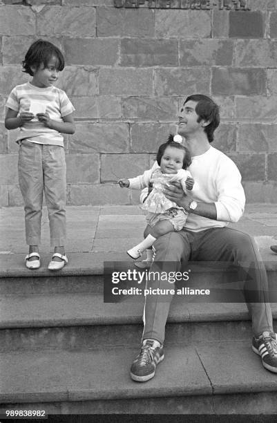 German international football player Gerd Mueller with two Mexcian children in Guanajuato during a team trip during the 1970 FIFA World Cup in Mexico.