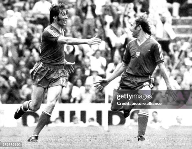 Polish goalgetter Grzegorz Lato is celebrating his winning goal against Brazil with teammate Kazimierz Deyna: Poland's national football team wins...