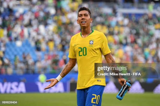 Roberto Firmino of Brazil celebrates victory following the 2018 FIFA World Cup Russia Round of 16 match between Brazil and Mexico at Samara Arena on...