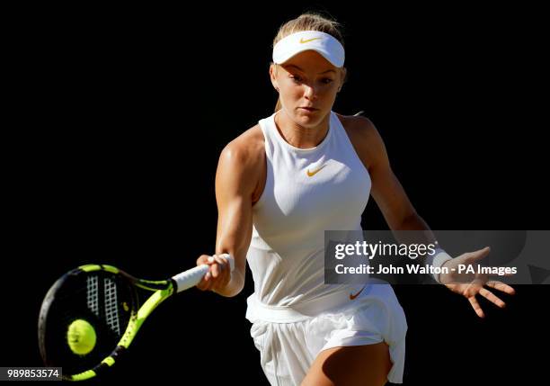 Katie Swan in action against Irina-Camelia Begu on day one of the Wimbledon Championships at the All England Lawn Tennis and Croquet Club, Wimbledon.