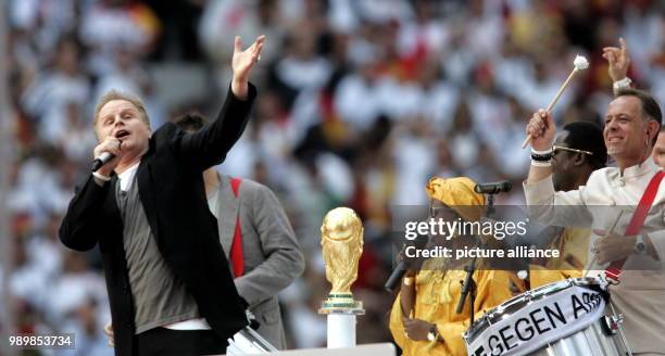 German singer Herbert Groenemeyer performs during the opening ceremony before the opening group A match of the 2006 FIFA World Cup between Germany...