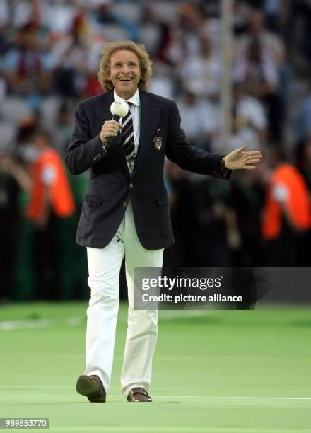 German entertainer Thomas Gottschalk addresses the audience during the opening ceremony before the opening group A match of the 2006 FIFA World Cup...