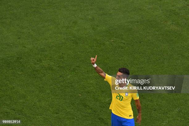 Brazil's forward Roberto Firmino celebrates scoring his team's second goal during the Russia 2018 World Cup round of 16 football match between Brazil...