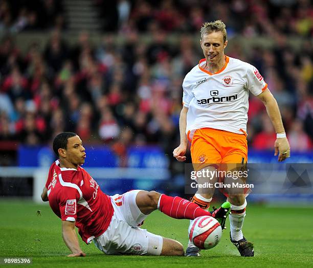 Brett Ormerod of Blackpool is challenged by Nathan Tyson of Nottingham Forest during the Coca Cola Championship Play-Off Semi-Final Second Leg match...