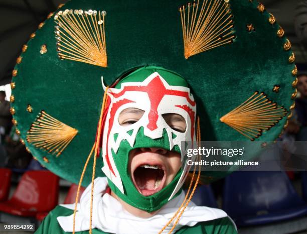 Mexican supporter cheers prior the group D preliminary match of 2006 FIFA World Cup between Mexico and Angola in Hanover, Friday, 16 June 2006....