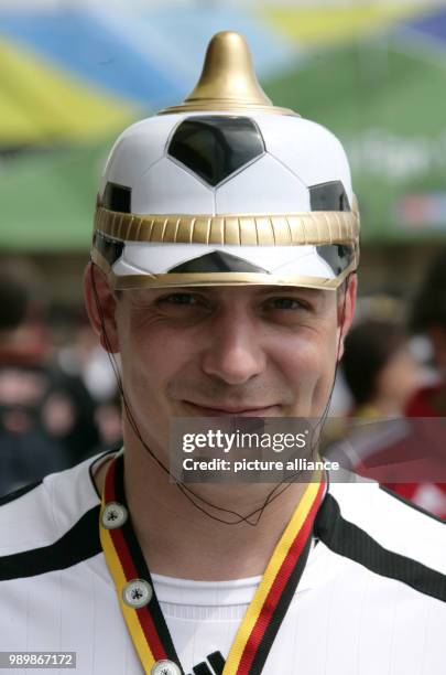 German supporter wearing a soccer ball shaped helmet prior to the group A preliminary match of 2006 FIFA World Cup Ecuador vs Germany at the Olympic...