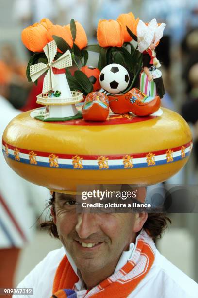 Supporter of the Netherlands wears a hat looking like a cheese prior the group C match of the 2006 FIFA World Cup between the Netherlands and...