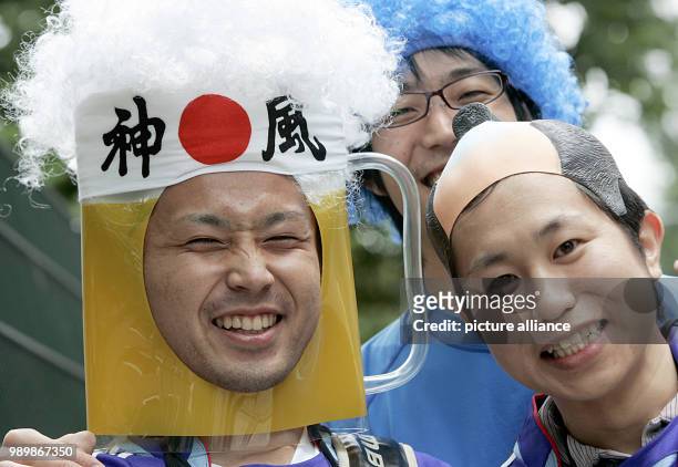 Japanese soccer supporters cheer prior to the group E preliminary match of 2006 FIFA World Cup between Czech Republic and Italy in Hamburg, on...