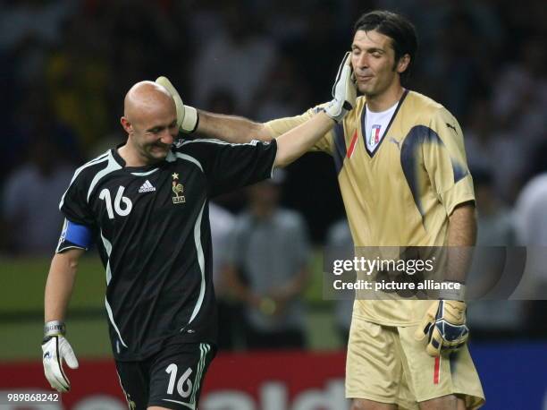 Goalkeeper Gianluigi Buffon from Italy and Fabien Barthez from France prior the penalty shoot out during the final of the 2006 FIFA World Cup between...