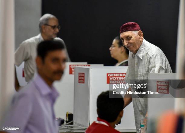Members of Parsi community arrive to cast their votes for Bombay Parsi Panchayat trust elections at The JB Vachha High School polling booth at Dadar...