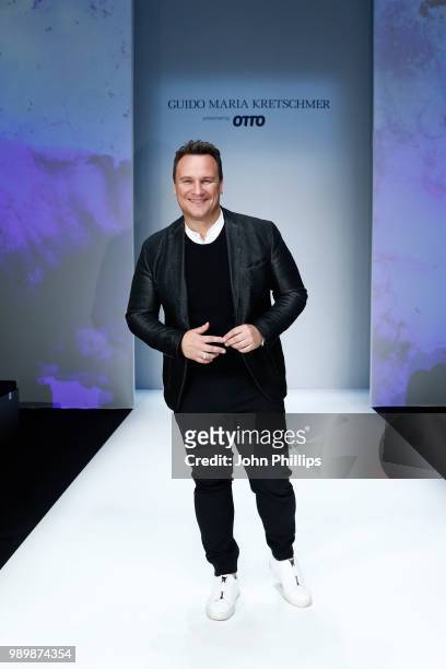 Designer Guido Maria Kretschmer poses after his show during the Berlin Fashion Week Spring/Summer 2019 at ewerk on July 2, 2018 in Berlin, Germany.