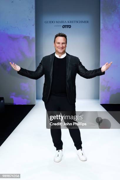 Designer Guido Maria Kretschmer poses after his show during the Berlin Fashion Week Spring/Summer 2019 at ewerk on July 2, 2018 in Berlin, Germany.