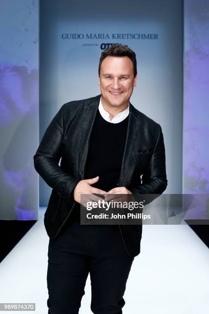 Designer Guido Maria Kretschmer poses after his show during the Berlin Fashion Week Spring/Summer 2019 at ewerk on July 2, 2018 in Berlin, Germany.