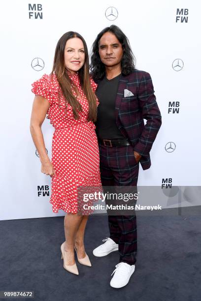 Christine Neubauer and Jose Campos attend the Guido Maria Kretschmer show during the Berlin Fashion Week Spring/Summer 2019 at ewerk on July 2, 2018...