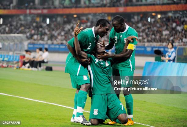 Summer Olympics 2008, Beijing, football, soccer, men, August 19th 2008 Nigeria - Belgium Chinedu OGBUKE OBASI is celebrating with Chibuzor OKONKWO...