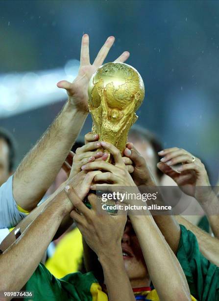 World Cup held in South Korea and Japan, finale, Germany vs Brazil 0-2, World Cup trophy and hands.
