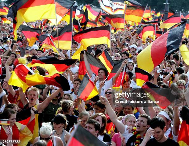 World Cup, first round, Ecuador 0-3 Germany, German fans are celebrating in downtown Stuttgart.