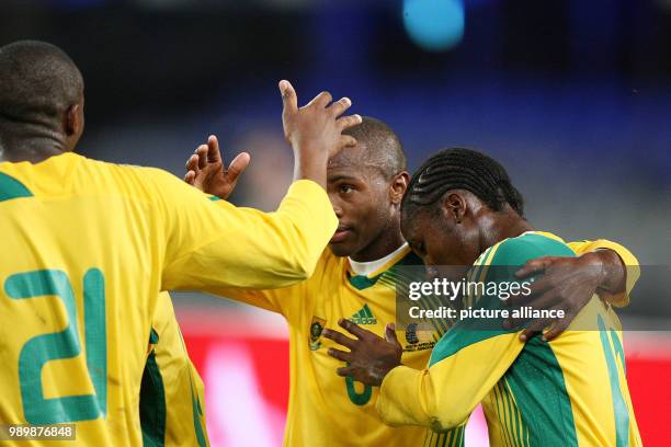 Football international Test Match November 20th 2007 South Africa 2 - 0 Canada Cheering RSA; Kagisho Dikgacoi, Bernard Parker are Hugging Teko Modise...