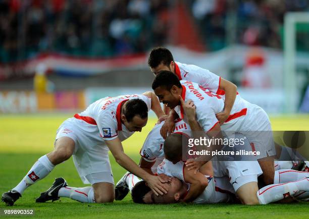 Football International 2010 FIFA World Cup Qualification October 10th 2009 Luxembourg - Switzerland The Swiss team is cheering after Phillipe...
