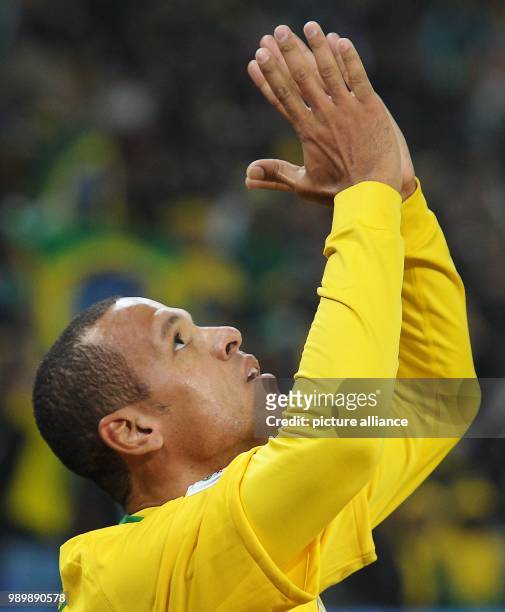 Luis Fabiano of Brazil celebrates after scoring the 1-0 during the FIFA World Cup 2010 group G match between Brazil and Ivory Coast at the Soccer...