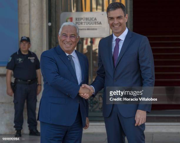 Portuguese Prime Minister Antonio Costa greets Prime Minister of Spain Pedro Sanchez upon his arrival for their bilateral meeting at Prime Minister...