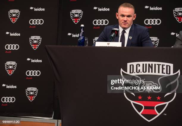 United's new recruit British footballer Wayne Rooney speaks at a press conference in Washington, DC, on July 2, 2018.