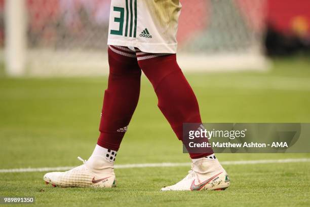 Detail View of the socks and boots of Carlos Salcedo of Mexico during the 2018 FIFA World Cup Russia Round of 16 match between Brazil and Mexico at...
