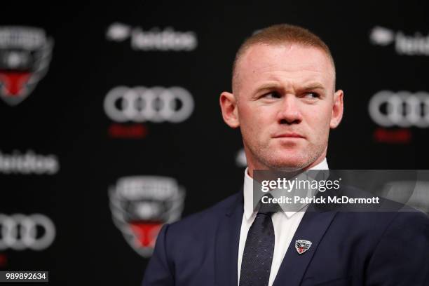 Wayne Rooney of DC United listens during his introduction press conference at The Newseum on July 2, 2018 in Washington, DC.