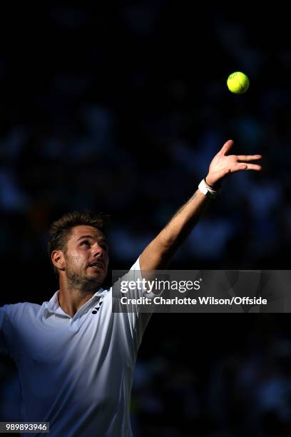 Stan Wawrinka v Grigor Dimitrov - Stan Wawrinka serves at All England Lawn Tennis and Croquet Club on July 2, 2018 in London, England.