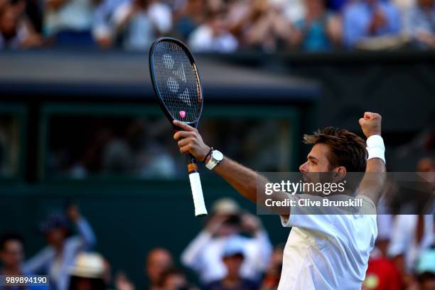 Stanislas Wawrinka of Switzerland celebrates match point against Grigor Dimitrov of Bulgaria during their Men's Singles first round match on day one...