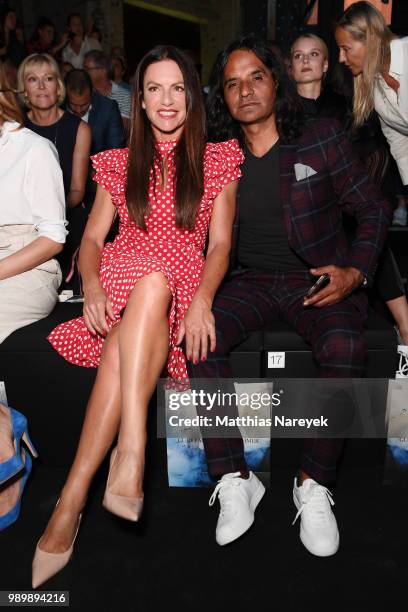 Christine Neubauer and Jose Campos attend the Guido Maria Kretschmer show during the Berlin Fashion Week Spring/Summer 2019 at ewerk on July 2, 2018...
