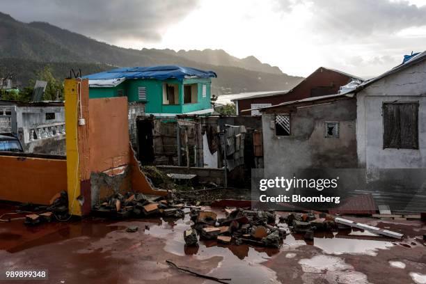 House damaged by Hurricane Maria stands in Grand Bay, Dominica, on Thursday, May 10, 2018. After the storm devastated Dominica last September, the...