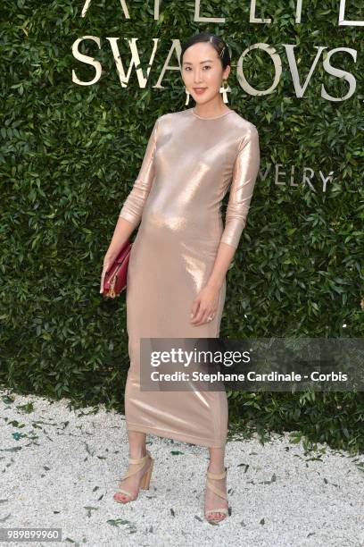 Chriselle Lim attends the Atelier Swarovski : Cocktail Of The New Penelope Cruz Fine Jewelry Collection as part of Paris Fashion Week on July 2, 2018...