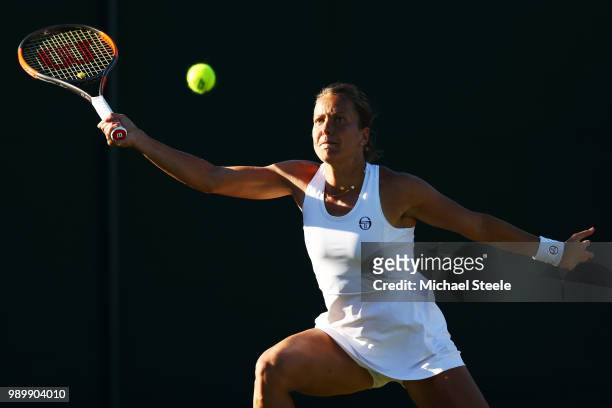 Barbora Strycova of Czech Republic returns against Svetlana Kuznetsova of Russua during their Ladies' Singles first round match on day one of the...