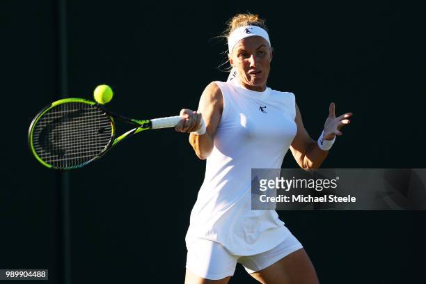 Svetlana Kuznetsova of Russia returns against Barbora Strycova of Czech Republic during their Ladies' Singles first round match on day one of the...