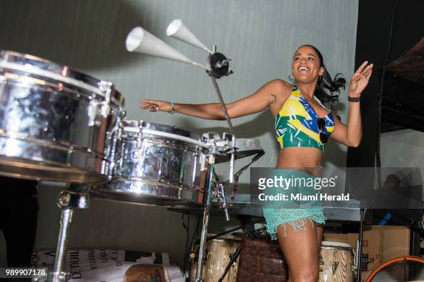 Brazil supporter Vanessa Joyce dances samba during halftime of the FIFA World Cup Round of 16 knockout stage watch party featuring Brazil versus...