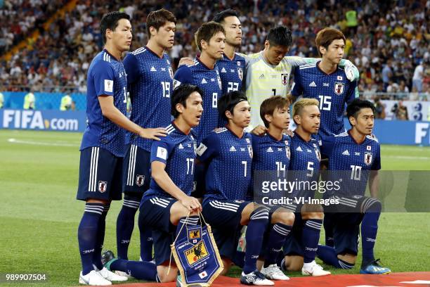 Back row Gen Shoji of Japan, Hiroki Sakai of Japan, Genki Haraguchi of Japan, Maya Yoshida of Japan, Japan goalkeeper Eiji Kawashima, Yuya Osako of...