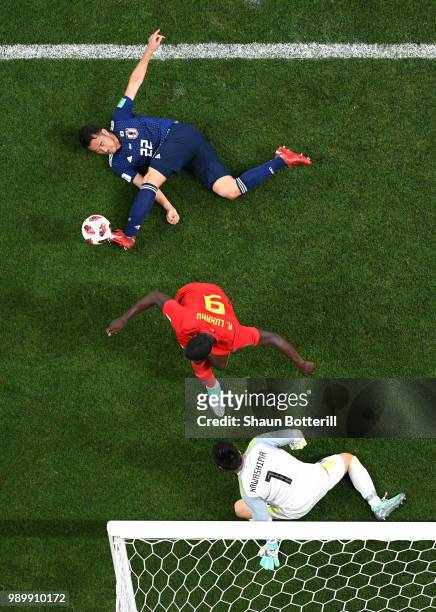 Maya Yoshida of Japan challenge for the ball with Romelu Lukaku of Belgium during the 2018 FIFA World Cup Russia Round of 16 match between Belgium...