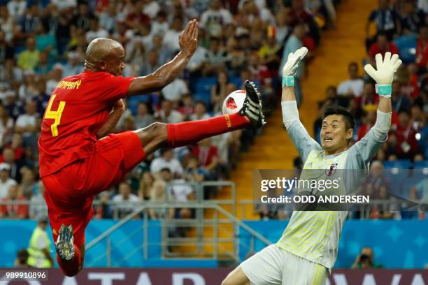 Belgium's defender Vincent Kompany tries to score against Japan's goalkeeper Eiji Kawashima during the Russia 2018 World Cup round of 16 football...