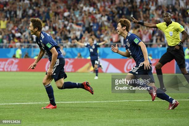 Genki Haraguchi of Japan celebrates after scoring his team's first goal during the 2018 FIFA World Cup Russia Round of 16 match between Belgium and...